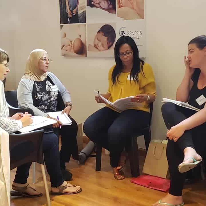 group of ladies sitting and discussing something