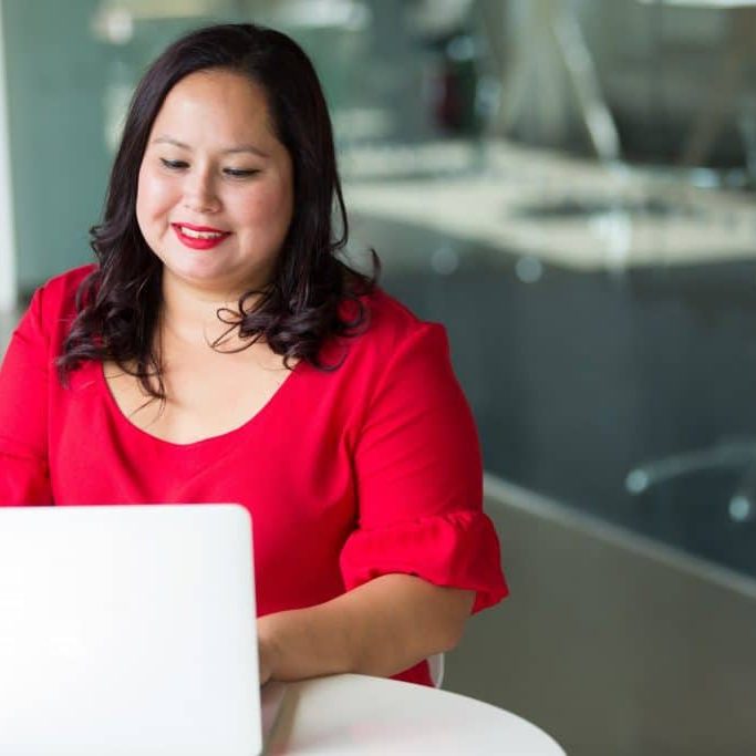 woman working on her computer
